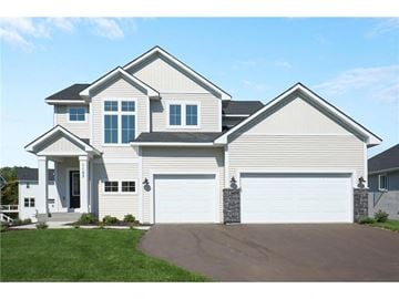 New Richmond house for rent - a white house with a garage and a driveway