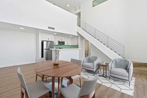 Burbank apartment for rent - a dining room with a table and chairs and a kitchen