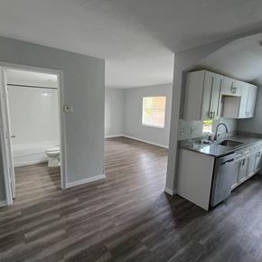 Fort Myers apartment for rent - A white bathroom with a toilet and sink.