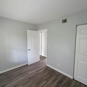 Fort Myers apartment for rent - A room with a white door and a white wall.