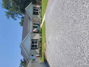 Gulf Breeze house for rent - an aerial view of an apartment building on the side of the street