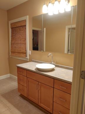 Pittsburgh apartment for rent - A bathroom with a sink and a mirror.