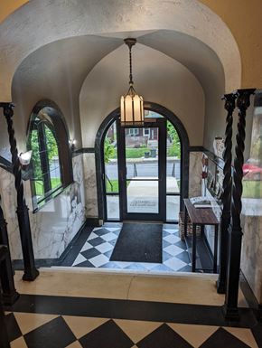 Pittsburgh apartment for rent - A black and white checkered floor in a hallway.
