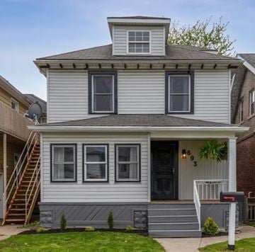 Windsor apartment for rent - a white house with a roof on top of it