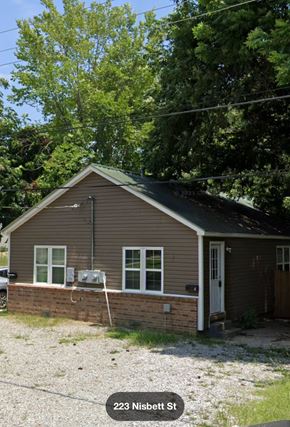 Jonesboro apartment for rent - A house with the number 223 on it.