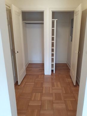 Pittsburgh apartment for rent - a room with a staircase and a closet and a wood floor