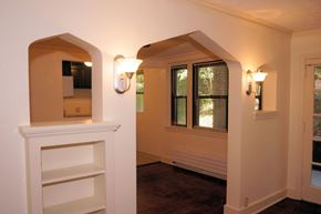 Pittsburgh apartment for rent - the living room of a house with white walls and a window