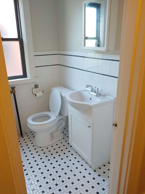 Pittsburgh apartment for rent - a bathroom with a toilet and a sink