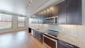 Kansas City apartment for rent - a kitchen with granite counter tops and stainless steel appliances