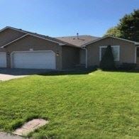 Spokane Valley apartment for rent - a house with a lawn in front of it