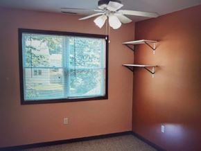 Trevose apartment for rent - A room with a window and a ceiling fan.