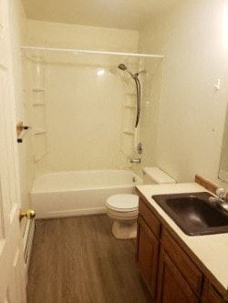 Eagle River apartment for rent - A white bathroom with a toilet, sink and bathtub.