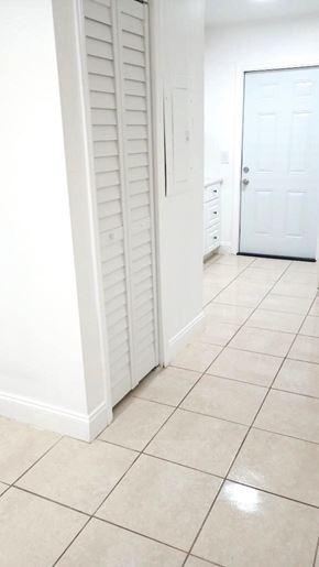 West Palm Beach apartment for rent - A white door is in a white hallway.