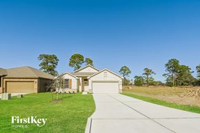 Beaumont house for rent - a neighborhood of single family homes with a sidewalk and grass