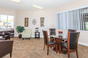 Thibodaux townhouse for rent - a dining room with a table and chairs and a window