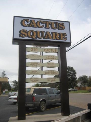 Levelland house for rent - A sign for Cactus Square stands in front of a parking lot.