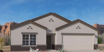 Tucson house for rent - a white house with two garage doors