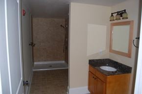Suffolk apartment for rent - a small bathroom with a sink and a shower
