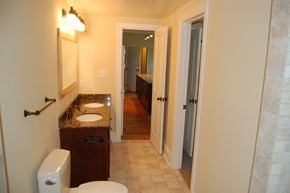 Suffolk apartment for rent - a small bathroom with a toilet and a sink