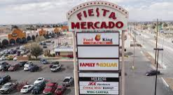 Socorro apartment for rent - the sign for the fiesta mercado in a parking lot