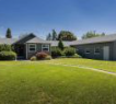 Spokane apartment for rent - a house with a yard in front of it