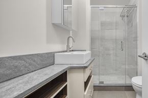 New York apartment for rent - a bathroom with a sink and a shower