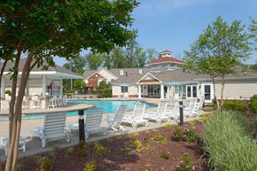 Newport News apartment for rent - lounge chairs pool-side at 700 Acqua