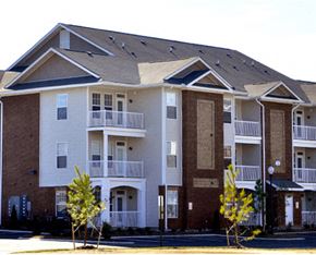 Newport News condo for rent - an apartment building on the side of a street