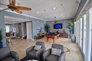 Bradenton house for rent - a large living room with a pool table