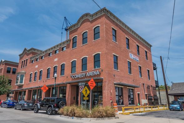 Mckinney apartment for rent - a brick building on the corner of a city street