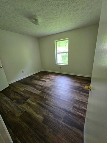Morehead house for rent - a living room with a hard wood floor and a window