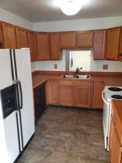 Eagle River apartment for rent - A kitchen with wooden cabinets and a white refrigerator.