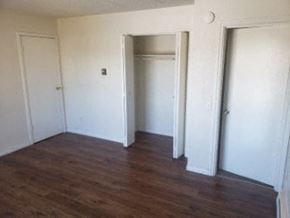 Anchorage apartment for rent - A room with wood floors and white walls.