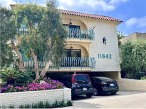 Los Angeles apartment for rent - A white building with the number 11642 on it.
