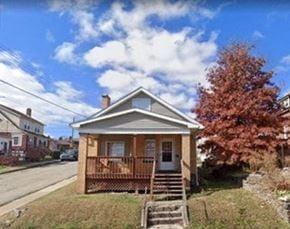 Mckeesport house for rent - a small house on the side of a street