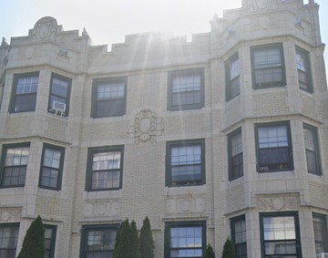 Chicago apartment for rent - a large white building with a lot of windows