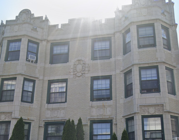 Chicago apartment for rent - a large white building with a lot of windows