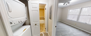 Ann Arbor apartment for rent - an empty laundry room with a washer and dryer in it