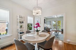 Tampa apartment for rent - A dining room with a white table and chairs.