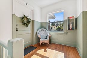 Tampa apartment for rent - a room with a chair and a door and a window