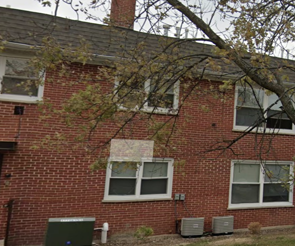 Oak Lawn apartment for rent - A red brick house with a tree in front.