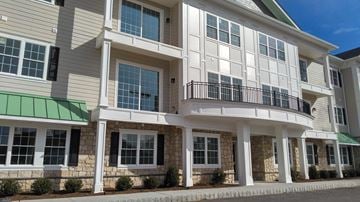 Warren apartment for rent - a building with a balcony and a street in front of it