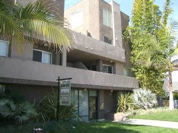 Los Angeles apartment for rent - an apartment building with a sign in front of it