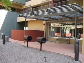 Phoenix apartment for rent - a building with two smoker pits in front of it