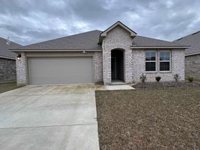 Duson house for rent - a brand new house with a garage door