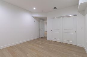 Inglewood apartment for rent - A room with white walls and wooden flooring with a door on the right.
