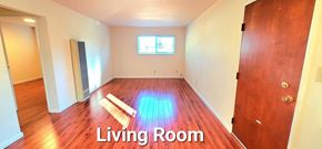 San Jose apartment for rent - a living room with a wooden floor and a wooden door
