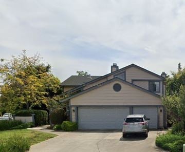 Cupertino house for rent - a house with a car parked in the driveway