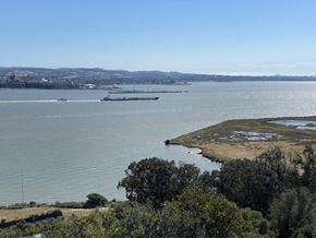 Vallejo apartment for rent - A large body of water with a boat and a barge in it.