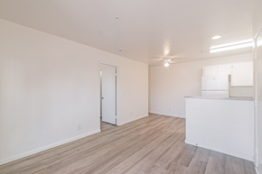 Rialto multi-family for rent - A room with a white door and a white counter.